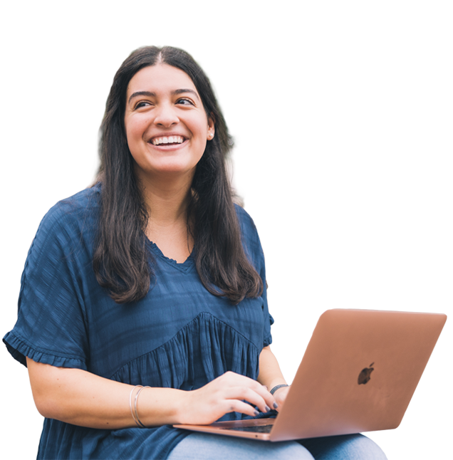 Photo of young African-American female student with headphones in looking at something on laptop computer