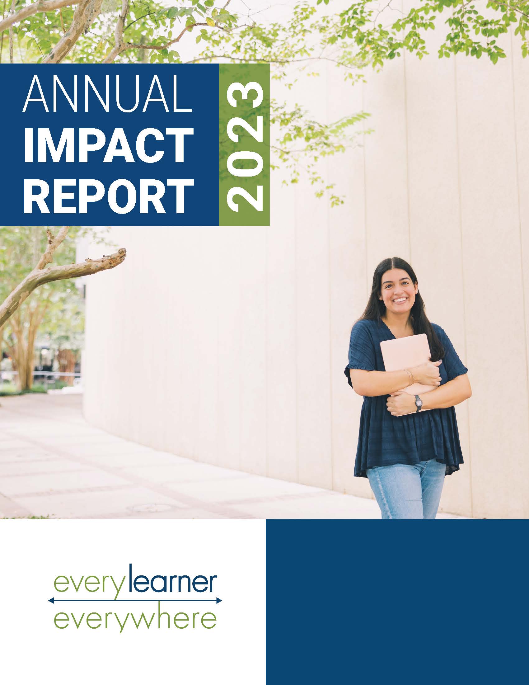 Annual Impact Report Cover with female student on campus holding laptop.