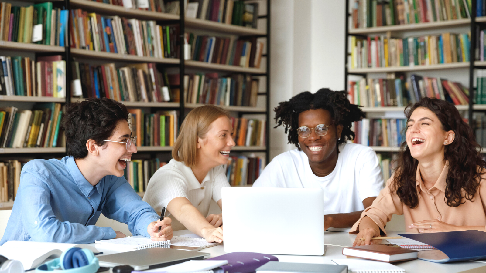 students in library studying using adaptive learning courseware