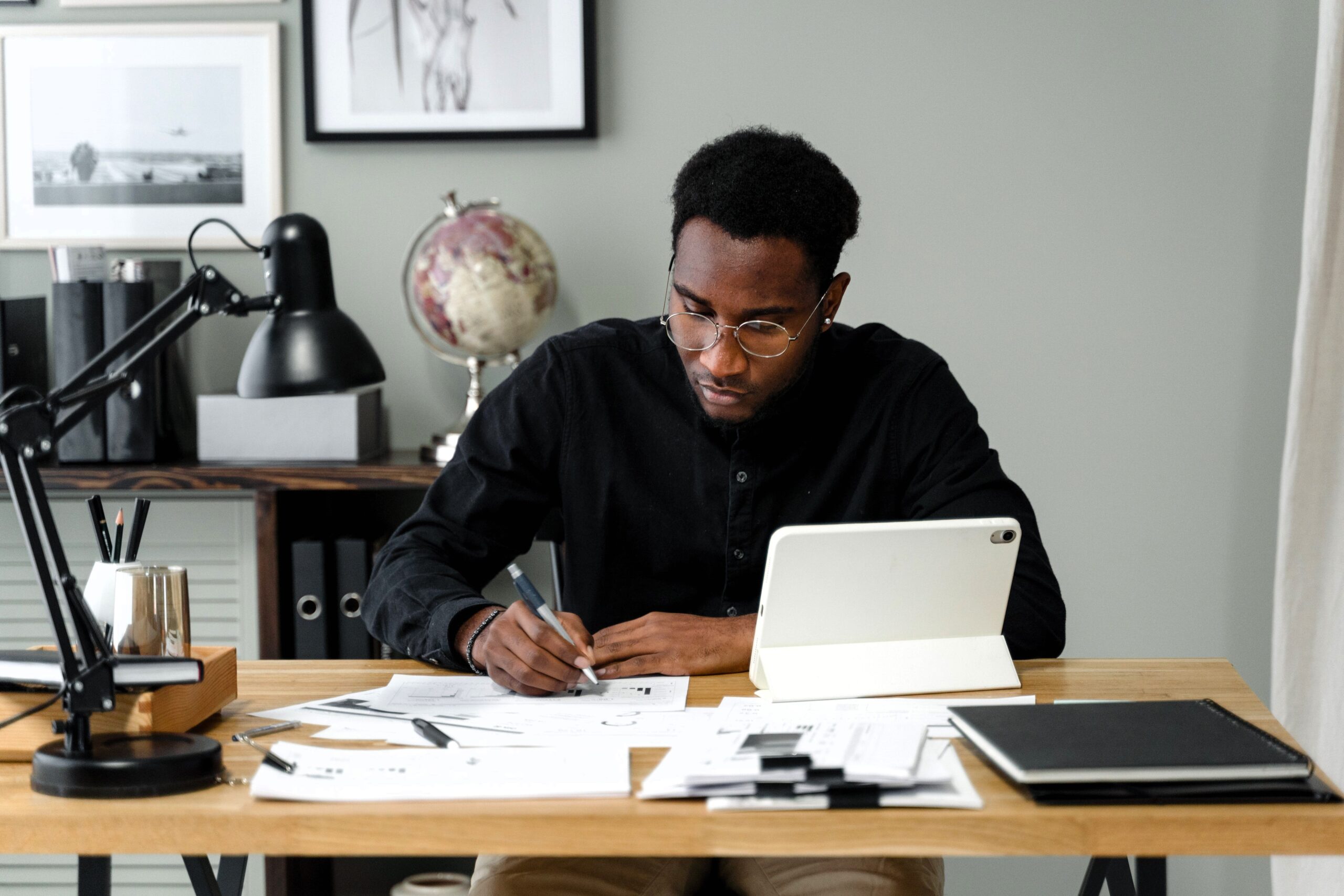 professor at computer grading papers practicing ungrading